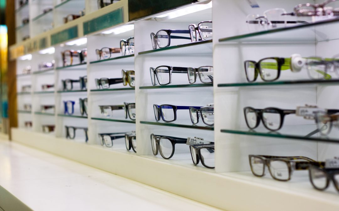 Picking eyeglasses from a framewall